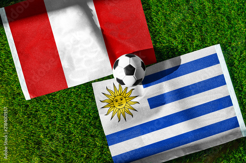 Quadro su tela Peru vs Uruguay football and soccer game background concept showing national fla