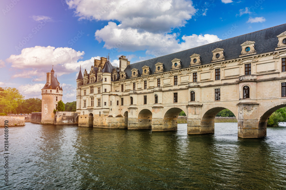 Fototapeta premium Château de Chenonceau, located in the Indre‑et‑Loire department of the Centre‑Val de Loire region in France, is a Renaissance riverside castle spanning the Cher River and known for its arches.