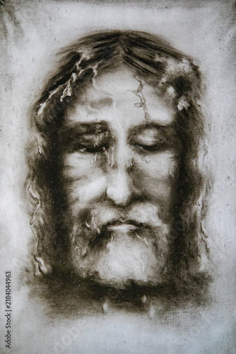 A monochrome artistic depiction shows the face of Jesus Christ with closed eyes and tears.