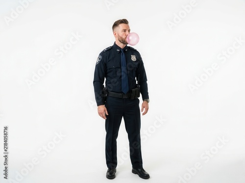 Law Enforcement Officer Chewing Bubble Gum With Pink Bubble