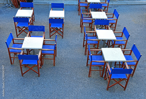 Seven tables and many chairs
