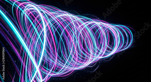 Futuristic abstract neon linear data vortex on black background