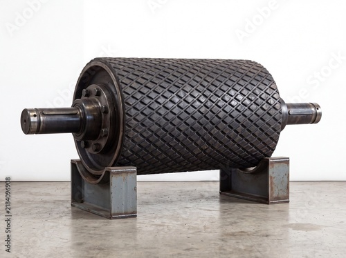 Conveyor Belt Drive Pulley Drum Mounted in Heavy Industrial Workshop