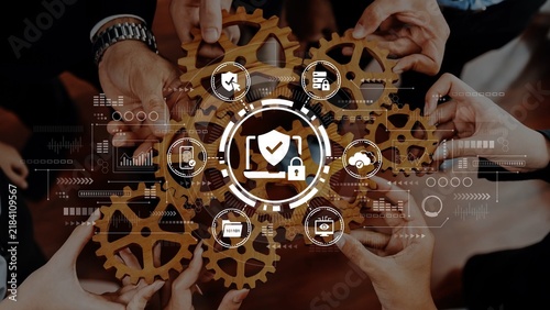 Obraz na plátně Collaborative Hands Holding Gears with Digital Icons Representing Technology, Security, and Innovation in Modern Business Settings