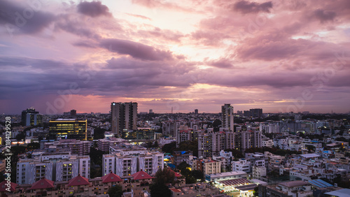 Aerial view of Bangalore city at sunset with dramatic evening sky