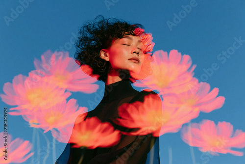 Creative Fashion Portrait with Projected Pink Flowers