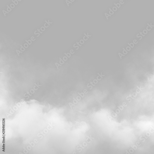 Foto Thick white smoke clouds rise against a black background