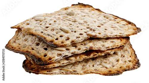 Foto Isolated stack of wholesome multigrain crispbread with sunflower seeds, healthy crunchy snack food