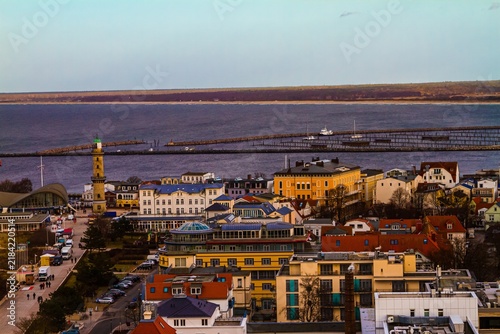 Coastal Town With Lighthouse And Harbor
