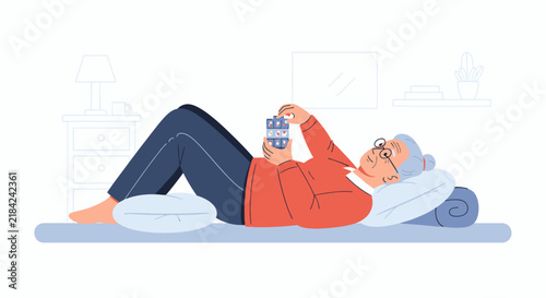 Senior Woman Relaxing And Browsing Smartphone Content At Home