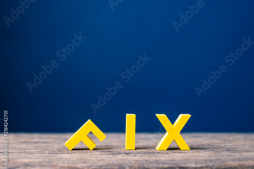 Bild auf Leinwand Fixing problems, repair and corrective action concept with fallen F in FIX word
