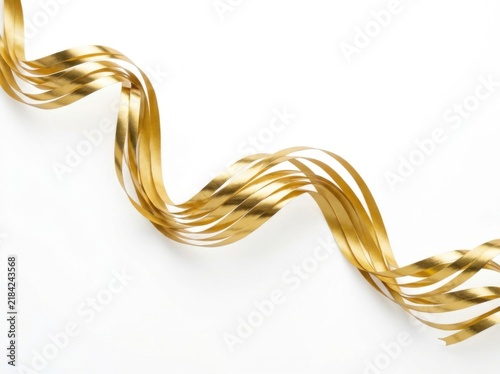 Elegant Gold Paper Streamers Flowing on White