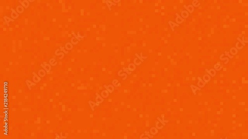 Square pixel blocks in slightly varied tones shift gently across a flat orange field, forming a subtle low contrast texture that fills the frame as a continuous loop.