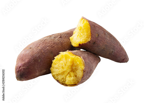 A sweet potato split in half on a white background