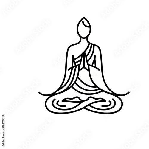 Monk meditating in lotus pose