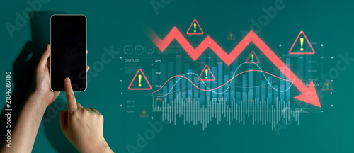 Foto Economic caution visualized with fluctuating market graph, alert symbols, and negative data trends
