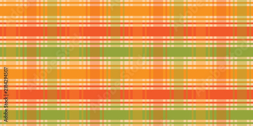 Colorful autumn plaid pattern featuring orange, green, yellow, and cream stripes with layered woven texture, creating a cheerful seasonal background for textiles, packaging, wallpaper, and prints.