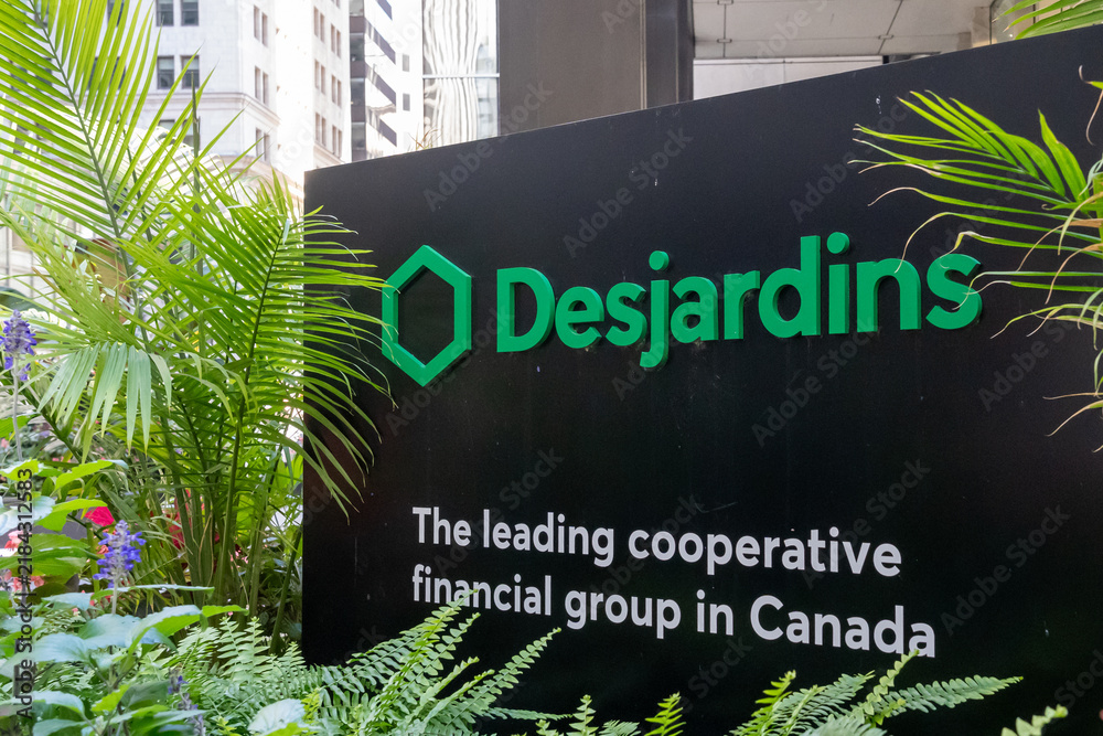 Obraz premium Toronto, Canada - September 7, 2026: Desjardins sign displayed outside their office building on King street in downtown Toronto. The Desjardins Group is a Canadian financial service cooperative and th