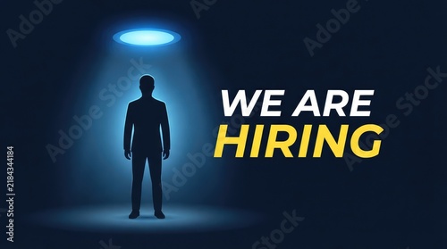 Professional silhouette under bright light emphasizing hiring opportunity in modern setting with Silhouette person formal attire stands beneath glowing circular light hiring text