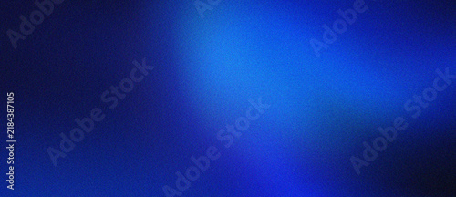 Deep blue abstract background with a soft glowing light in bright royal blue, featuring a subtle grainy texture for modern designs.