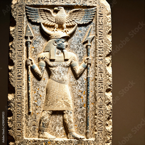 an ancient stone stele depicting Baalshamin