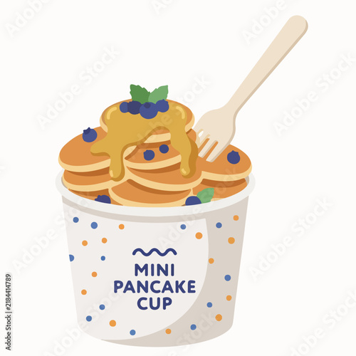 Sweet mini pancakes in cup