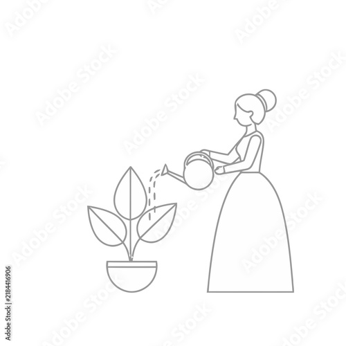 Woman watering a potted plant
