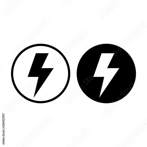 Lightning bolt symbols in black and white circles, warning signs