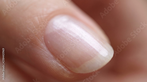 Macro shot of natural fingernail cuticle and healthy nail bed
