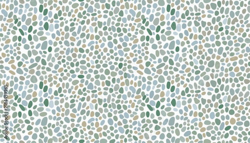 Tiny rounded river stones and pebbles in soft earthy shades create a dense natural mosaic in a seamless pattern.