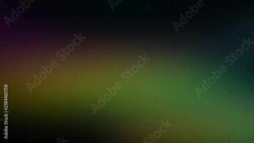 Dark moody abstract gradient background with soft glowing color transitions and blurred light