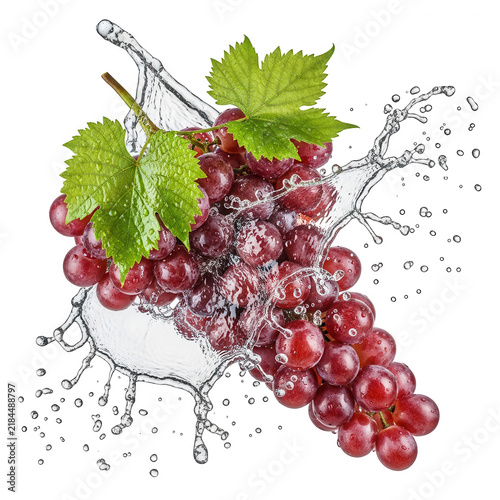 Fresh red grapes with green leaves and water splash effect isolated on transparent background for healthy lifestyle advertising imagery