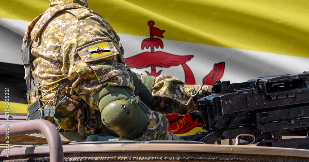 Obraz premium Brunei Darussalam flag with soldier at machinegun turret