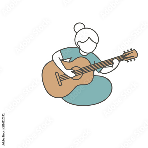 Person playing acoustic guitar