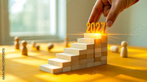 Business growth planning for 2027 with ascending steps and leadership progress