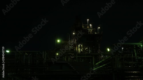 Dark Industrial Plant Interior with Pipes and Machinery at Night in Chidoricho, Kawasaki