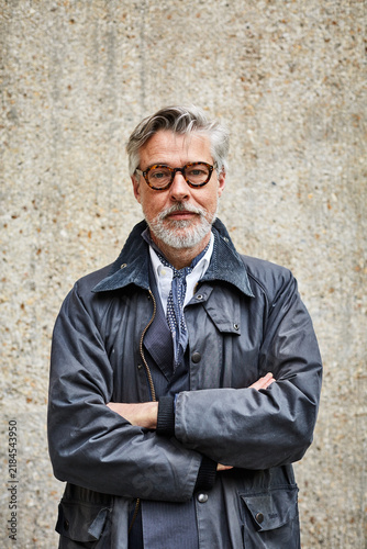 Cuadro en lienzo Wall, portrait and businessman with arms crossed, pride or real estate developer with career growth