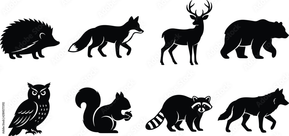 Fototapeta premium Black Silhouette Collection of Woodland Animals Including Hedgehog Fox Deer Bear Owl Squirrel Raccoon and Wolf
