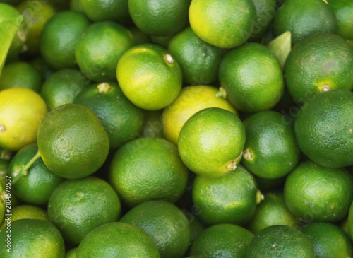 Many fresh calamansi limes as background	