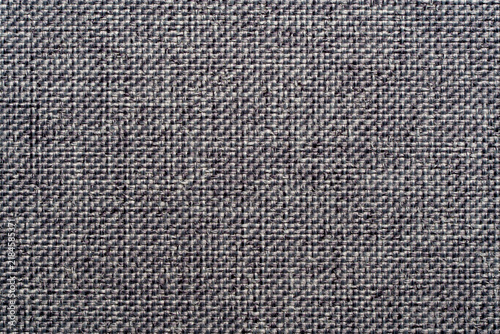 Grey upholstery fabric texture background with canvas weave. Closeup gray textile material canvas background abstract dark melange cotton or linen pattern for furniture upholstery garment wallpaper