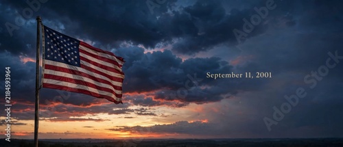 Heartfelt tribute on september 11 2001 featuring american flag set against dramatic sky representing hope remembrance