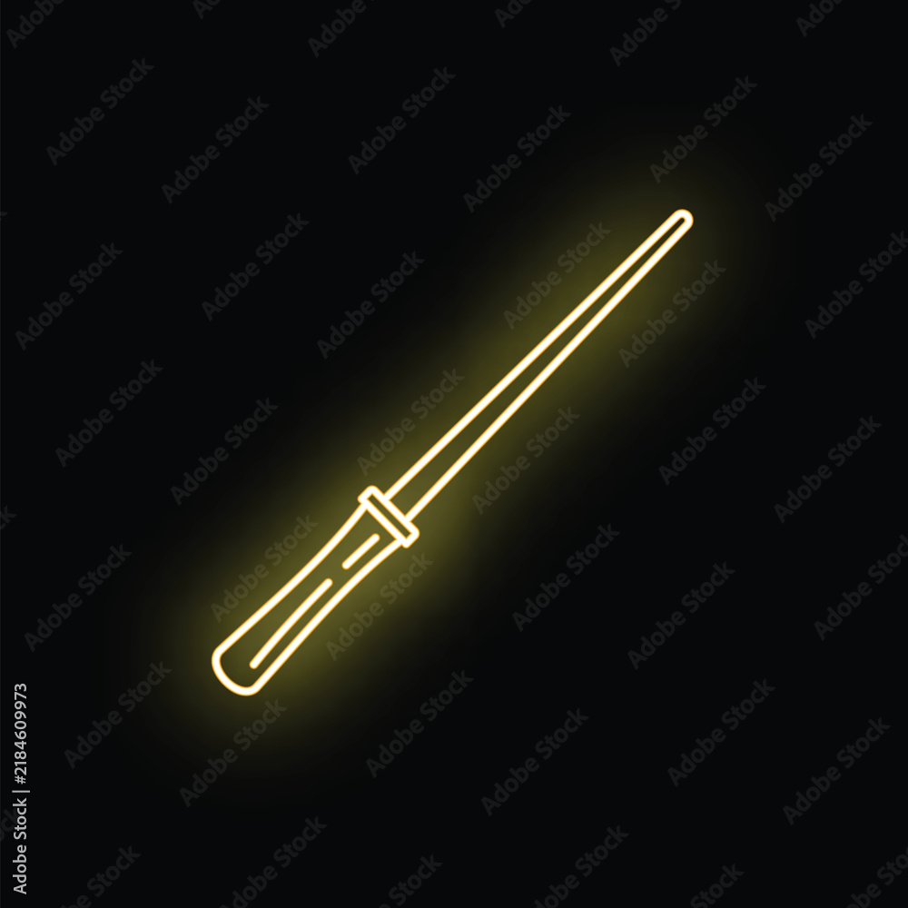 Obraz premium Neon magic wand glowing with yellow light in the dark