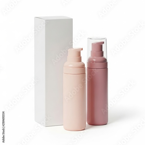 Two skincare spray bottles with box isolated on white background
