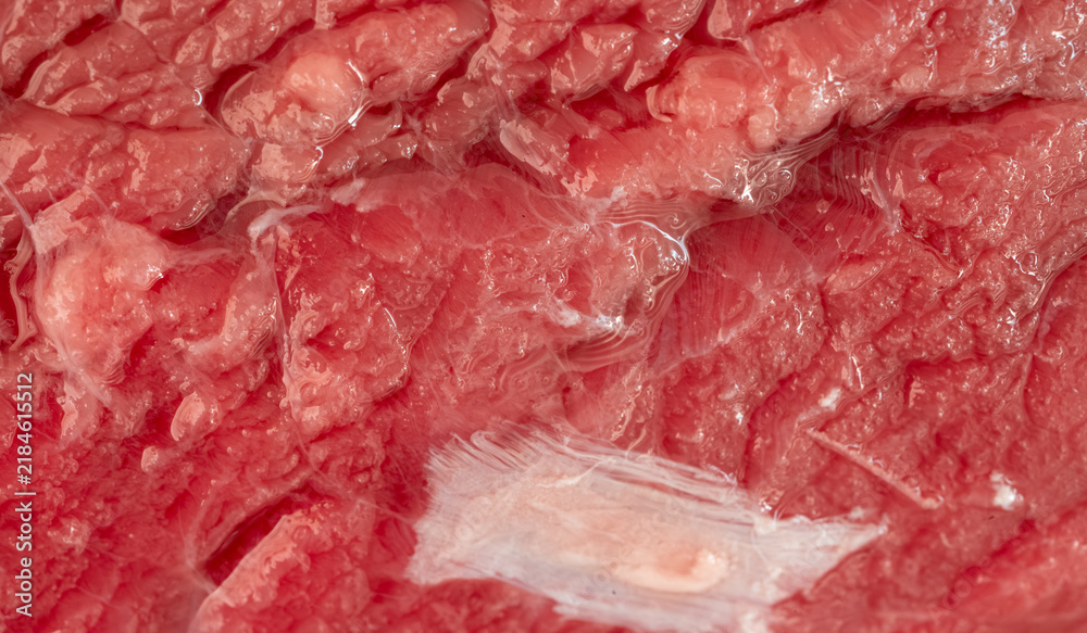 Obraz premium Raw beef steak macro pattern, red meat slice closeup