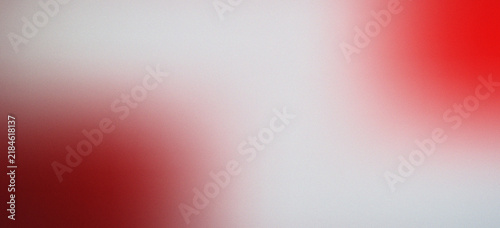 Foto Blurred white and vivid red color grainy gradient background design