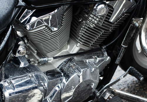 Obraz na płótnie Close-up of V-twin motorcycle engine featuring intricate chrome details and cool