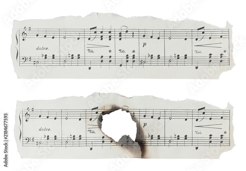 Set of torn and burned pieces of old sheet music paper isolated on transparent background. Collection for vintage music, nostalgia, destruction and artistic design concepts