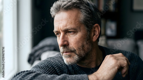 Pensive sad mature man portrait