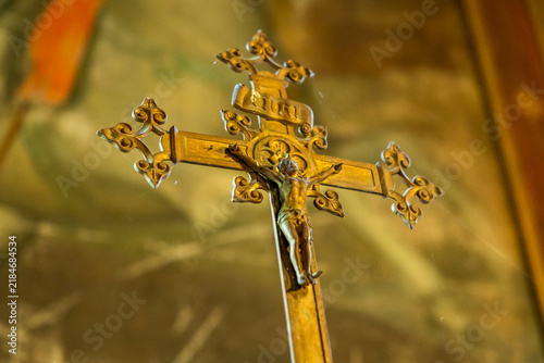 Close-up of a gilded altar crucifix with an INRI inscription, Gers, Saint Georges, France