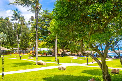 Luxury Marriott Phuket tropical paths palms loungers Merlin Beach turquoise Thailand.